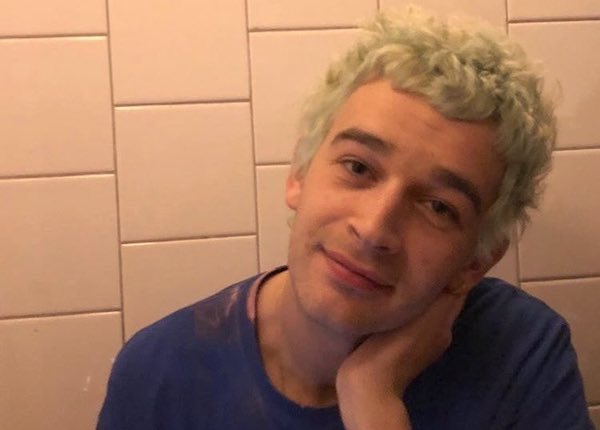 Matty Healy has green hair now.  Coup De Main Magazine